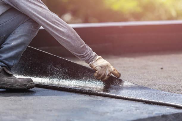 Professional Basement Waterproofing technician working in Caledonia, WI